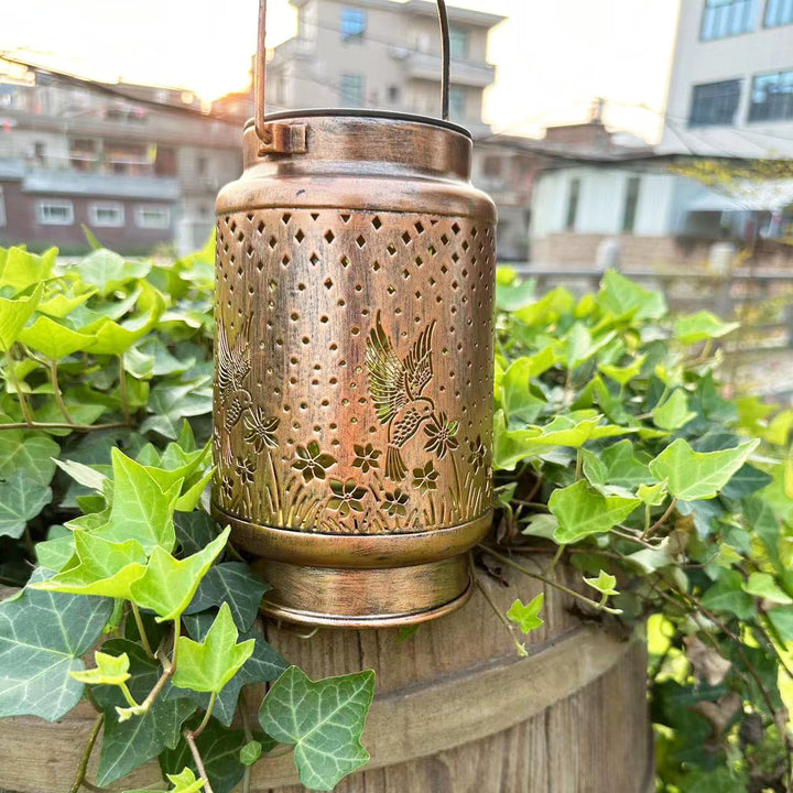 Contemporary Retro Solar Waterproof Iron Portable Hollowed Lantern Bird Flower LED Outdoor Light Landscape Lighting For Garden