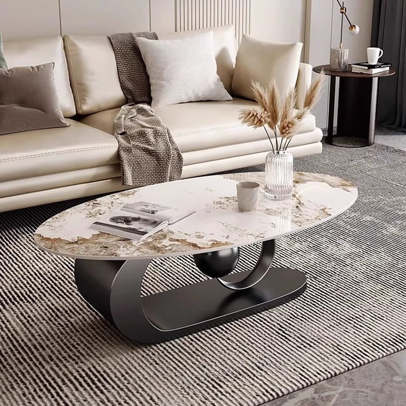 Table basse créative en pierre ovale de luxe moderne avec base en acier au carbone pour salon 