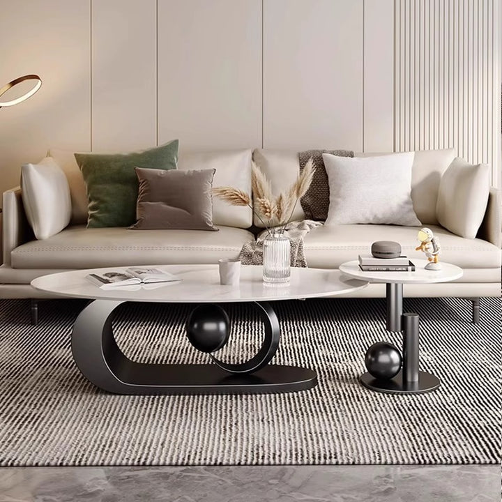 Table basse créative en pierre ovale de luxe moderne avec base en acier au carbone pour salon 