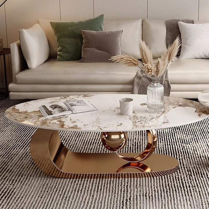 Table basse créative en pierre ovale de luxe moderne avec base en acier au carbone pour salon 