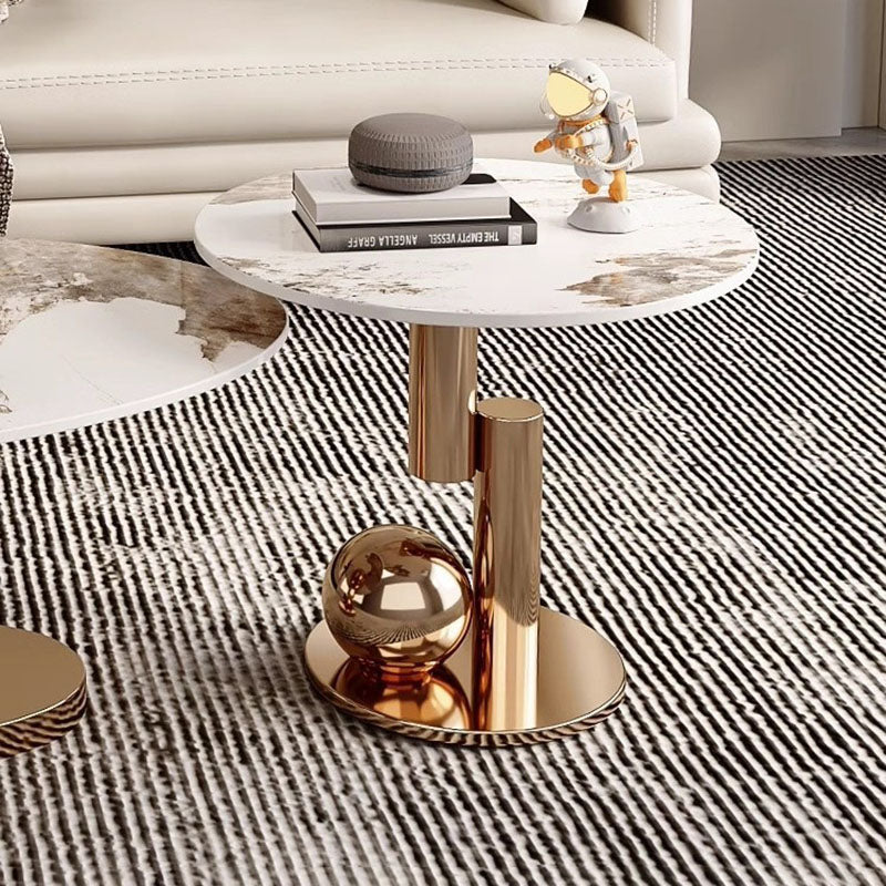 Table basse créative en pierre ovale de luxe moderne avec base en acier au carbone pour salon 