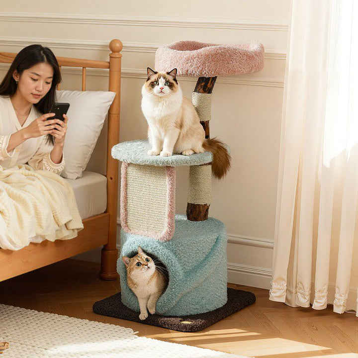Arbre à chat contemporain et créatif en panneaux de particules ronds, bois fruitier naturel, tissu velours et sisal pour salon 