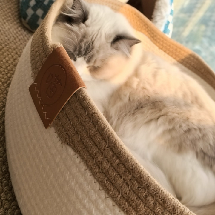 Cama para gatos tejida con cuerda de lino-algodón ovalada contemporánea escandinava para sala de estar y dormitorio 