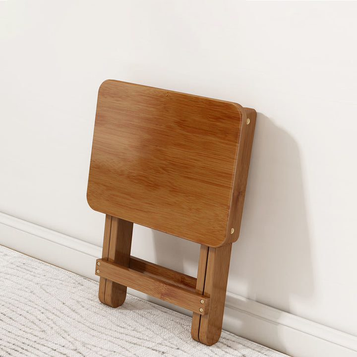 Moderner minimalistischer rechteckiger Bambusfußhocker, faltbar für das Wohnzimmer 