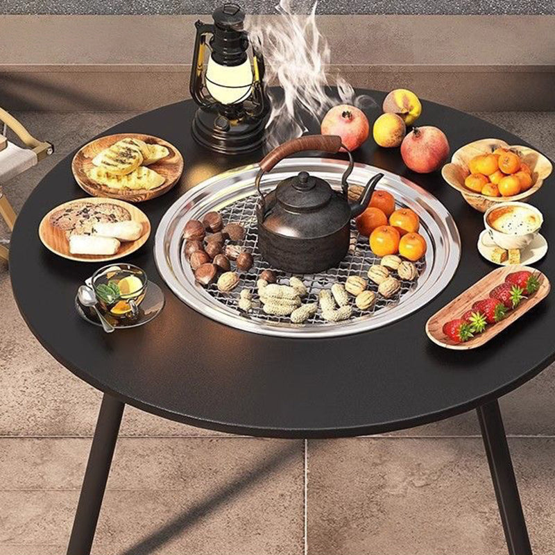 Moderner minimalistischer runder Eisen-Holz-Brett-Edelstahl-Außentisch mit 3-beinigem klappbarem Design für den Garten 