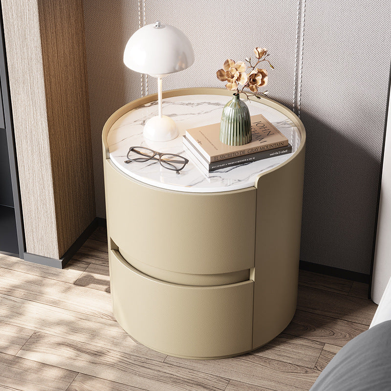 Mesita de noche redonda moderna minimalista de cuero sintético terciopelo con losa de roca y madera contrachapada sólida con 2 cajones para uso junto a la cama 