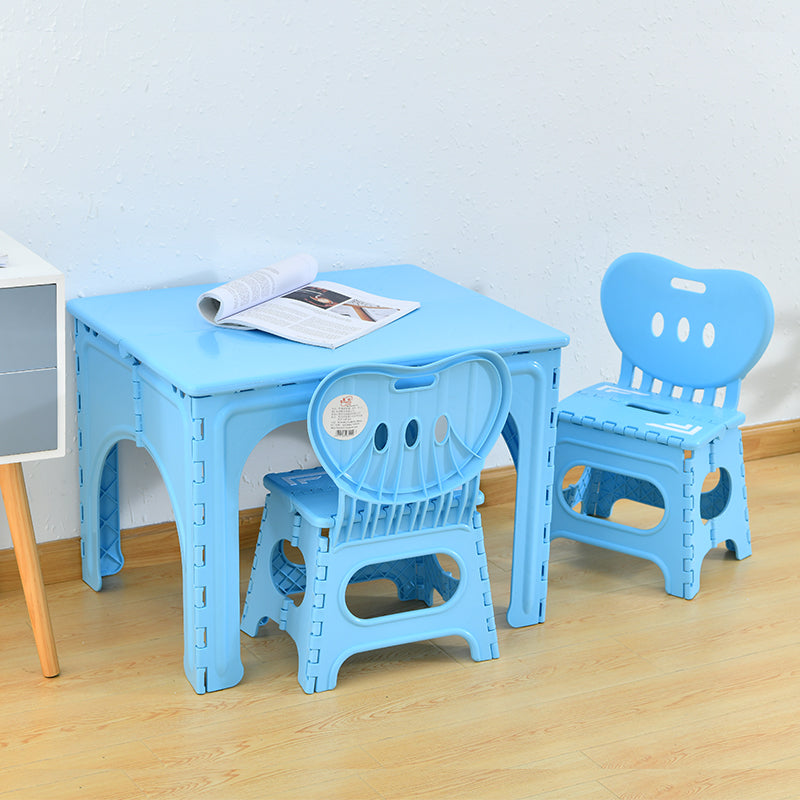 Table et ensemble de chaises pour enfants rectangulaires creux PP minimaliste moderne avec design pliable pour salle à manger ou salon 