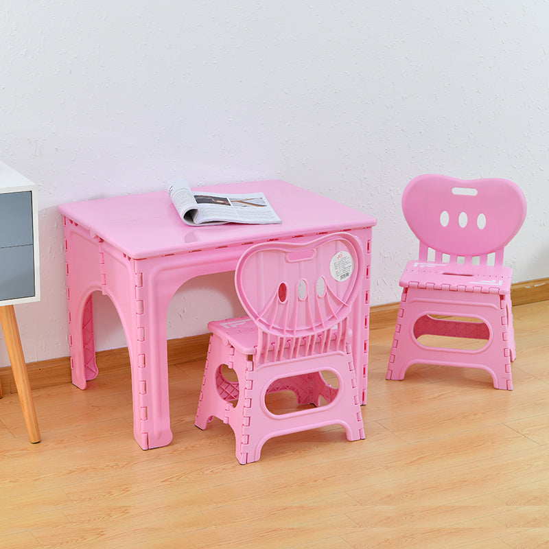 Table et ensemble de chaises pour enfants rectangulaires creux PP minimaliste moderne avec design pliable pour salle à manger ou salon 