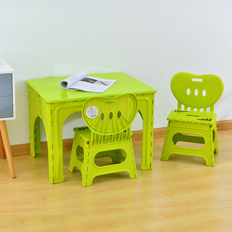 Table et ensemble de chaises pour enfants rectangulaires creux PP minimaliste moderne avec design pliable pour salle à manger ou salon 