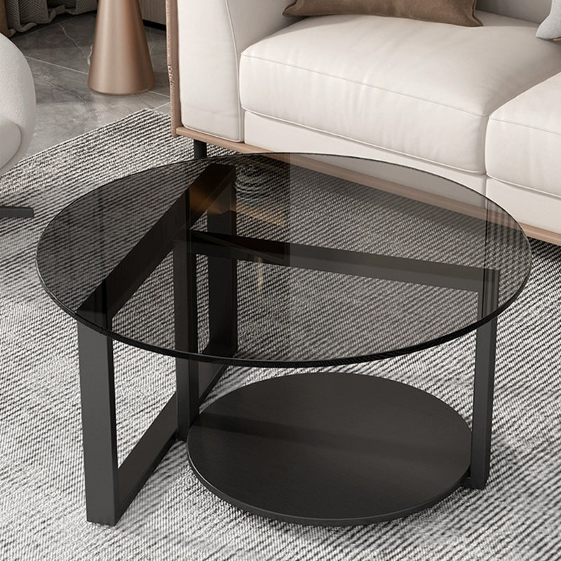 Table basse moderne minimaliste avec dessus en verre et cadre en fer rond à 2 niveaux pour salon 