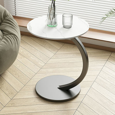 Table d'appoint en acier au carbone avec base ronde et incurvée minimaliste moderne pour salon 