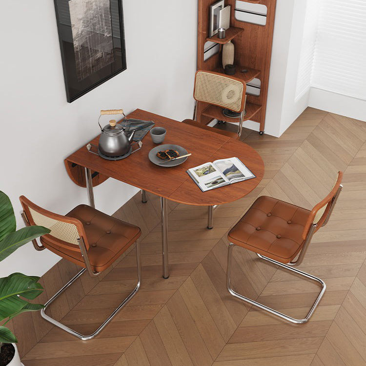 Table à manger moderne minimaliste pliable ovale en bois avec plateau en mélamine pour 4 places en acier inoxydable 
