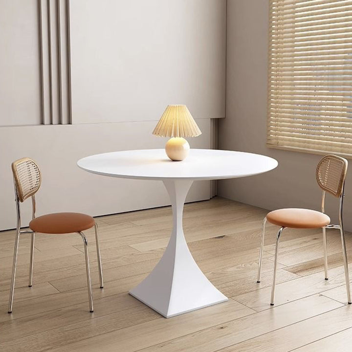 Mesa de comedor moderna minimalista redonda de losa de cerámica y acero al carbono para 2-8 asientos 
