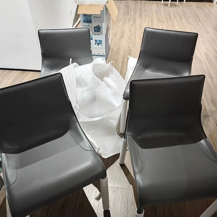 Moderner minimalistischer Schreibtischstuhl aus Kohlenstoffstahl mit Sattelleder, Rückenlehne, ohne Armlehnen für das Home Office 