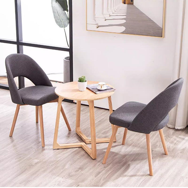 Silla de comedor de madera maciza de cuero de algodón de simplicidad moderna con respaldo sin brazos para comedor 