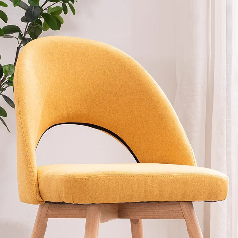 Silla de comedor de madera maciza de cuero de algodón de simplicidad moderna con respaldo sin brazos para comedor 