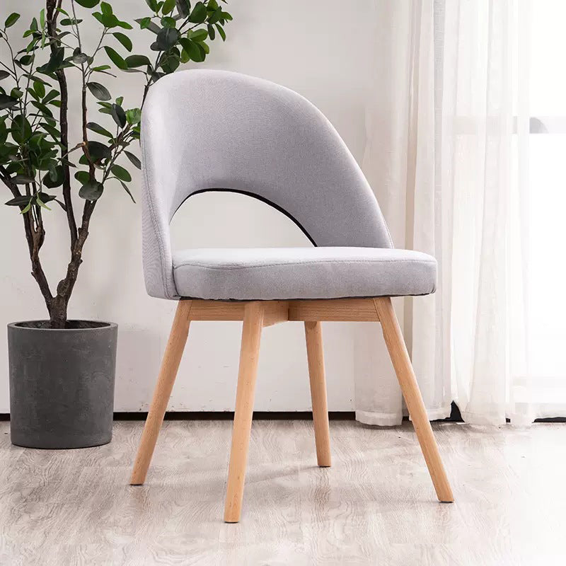 Silla de comedor de madera maciza de cuero de algodón de simplicidad moderna con respaldo sin brazos para comedor 