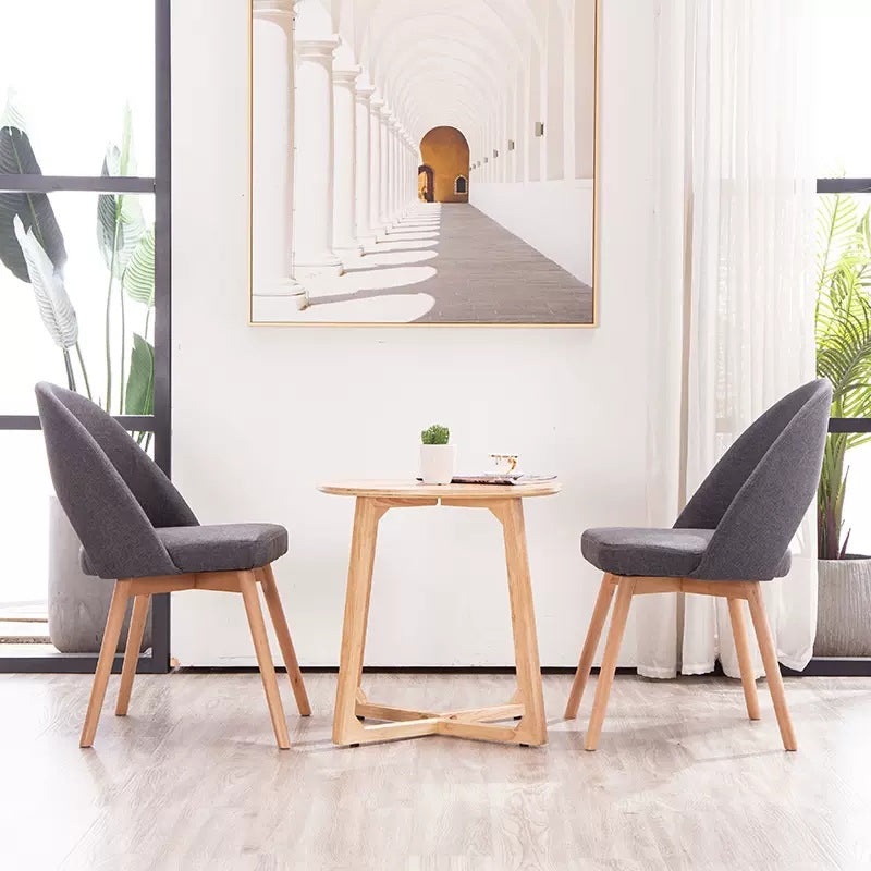 Silla de comedor de madera maciza de cuero de algodón de simplicidad moderna con respaldo sin brazos para comedor 