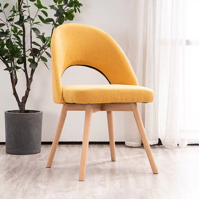 Silla de comedor de madera maciza de cuero de algodón de simplicidad moderna con respaldo sin brazos para comedor 