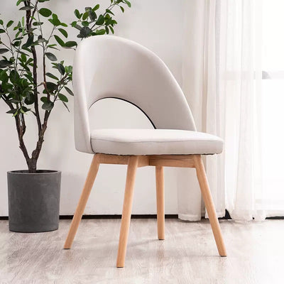Silla de comedor de madera maciza de cuero de algodón de simplicidad moderna con respaldo sin brazos para comedor 