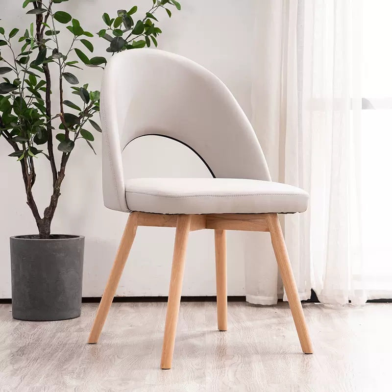 Silla de comedor de madera maciza de cuero de algodón de simplicidad moderna con respaldo sin brazos para comedor 
