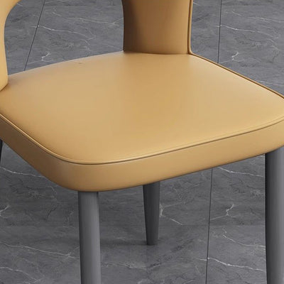 Silla de comedor contemporánea escandinava de cuero sintético y acero al carbono, respaldo sin brazos para comedor 