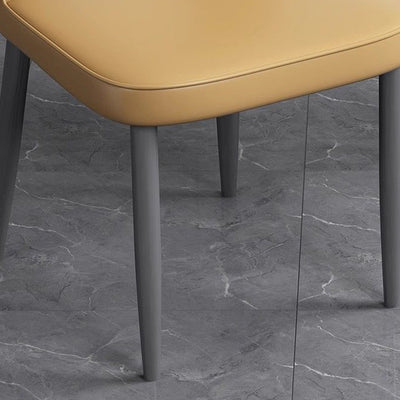 Silla de comedor contemporánea escandinava de cuero sintético y acero al carbono, respaldo sin brazos para comedor 