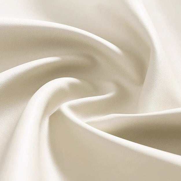 Taburete de tocador moderno minimalista color crema tipo nube de hierro y piel sintética napa, sin brazos y con respaldo, para dormitorio 