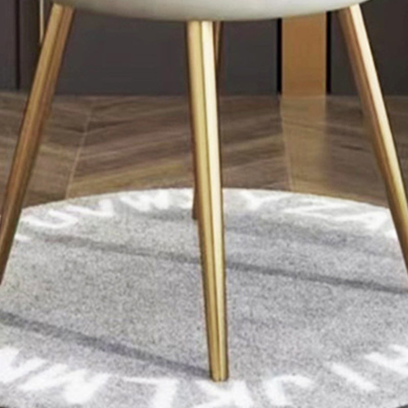 Silla de comedor sin brazos con respaldo de acero al carbono tapizada en franela de pétalos redondos nórdicos contemporáneos para comedor 