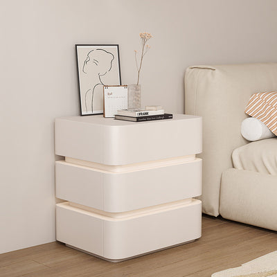 Table de chevet moderne minimaliste en bois massif avec bande lumineuse à trois tiroirs pour chambre 