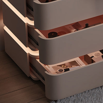 Table de chevet moderne minimaliste en bois massif avec bande lumineuse à trois tiroirs pour chambre 