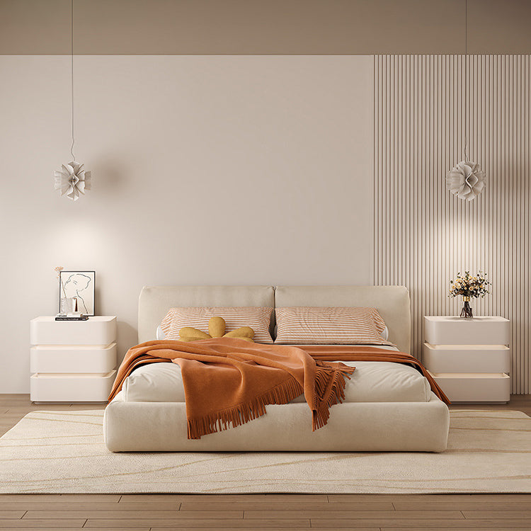 Table de chevet moderne minimaliste en bois massif avec bande lumineuse à trois tiroirs pour chambre 