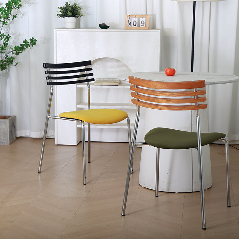 Silla de comedor curva de tela e hierro minimalista moderna para comedor y sala de estar 