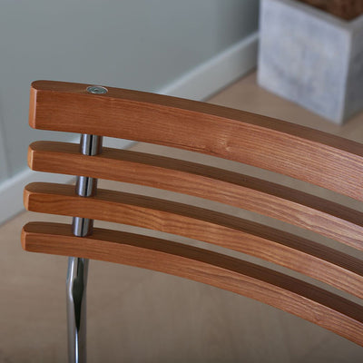 Silla de comedor curva de tela e hierro minimalista moderna para comedor y sala de estar 