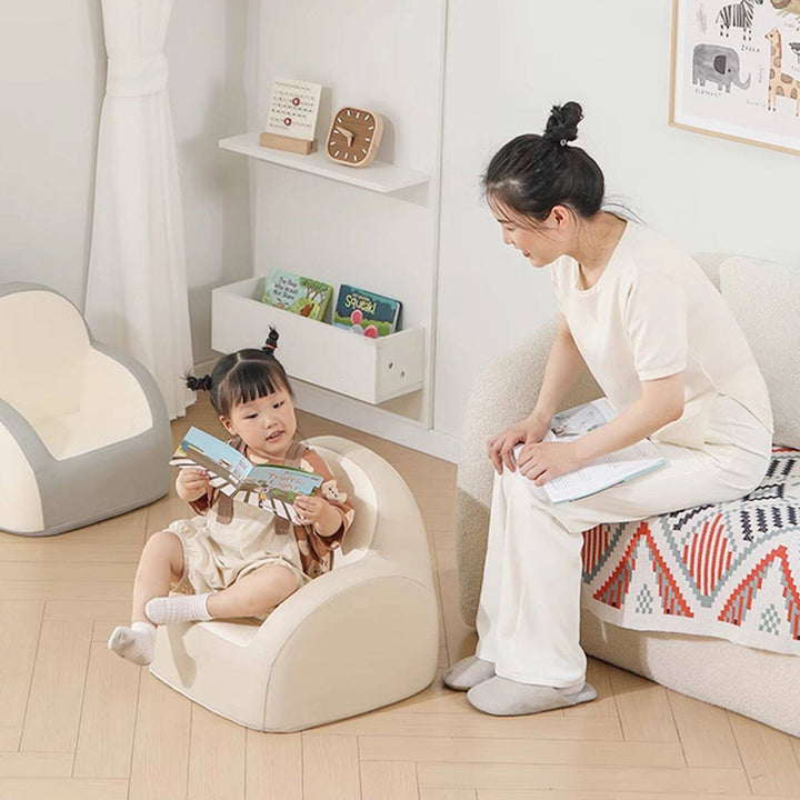 Contemporary Nordic PU Leather Sponge Arc Lightweight Kids Accent Chair Backrest Armrest For Living Room