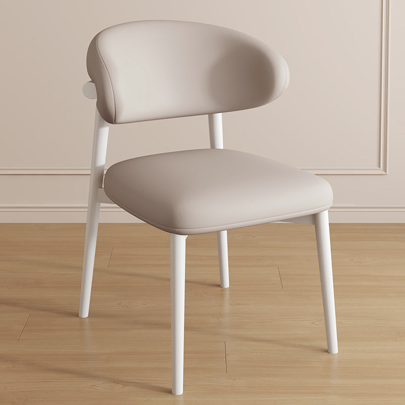 Zeitgenössischer Luxus Esszimmerstuhl mit geschwungener Rückenlehne aus PU-Leder und Carbonstahl für das Esszimmer 