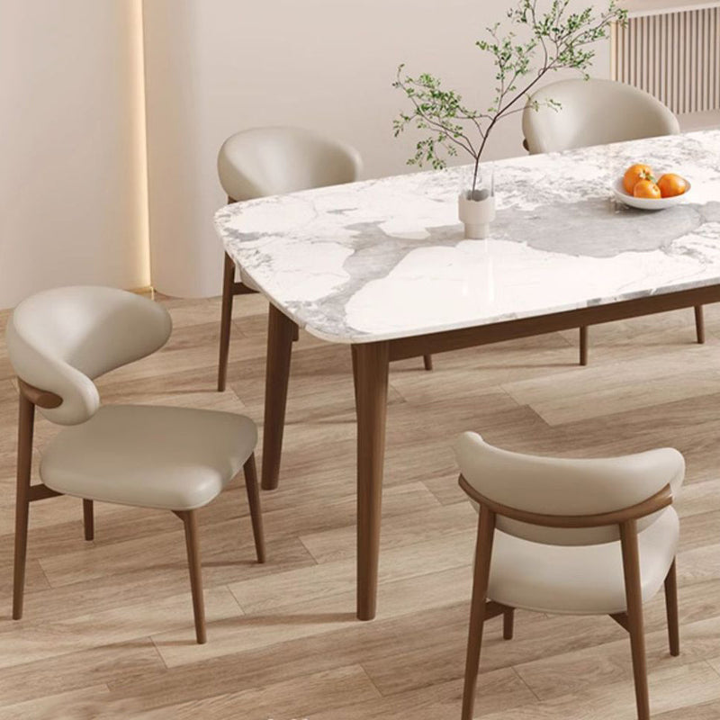 Zeitgenössischer Luxus Esszimmerstuhl mit geschwungener Rückenlehne aus PU-Leder und Carbonstahl für das Esszimmer 