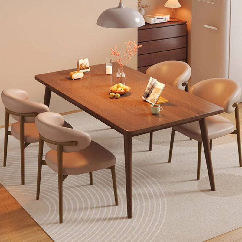 Zeitgenössischer Luxus Esszimmerstuhl mit geschwungener Rückenlehne aus PU-Leder und Carbonstahl für das Esszimmer 