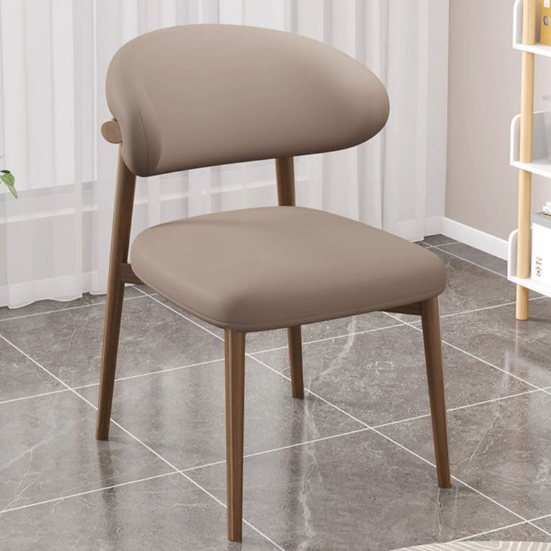 Zeitgenössischer Luxus Esszimmerstuhl mit geschwungener Rückenlehne aus PU-Leder und Carbonstahl für das Esszimmer 