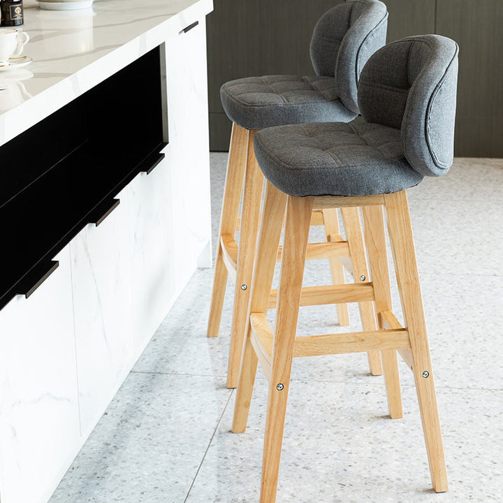 Taburete de bar redondo de lujo contemporáneo en tela, cuero sintético encerado al aceite y madera de caucho, con respaldo bajo y reposapiés, para comedor 