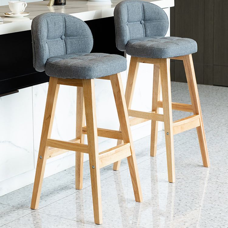 Taburete de bar redondo de lujo contemporáneo en tela, cuero sintético encerado al aceite y madera de caucho, con respaldo bajo y reposapiés, para comedor 