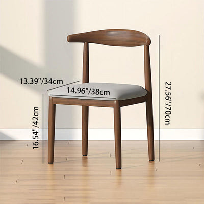 Chaise de salle à manger contemporaine scandinave en cuir rembourré avec dossier en acier au carbone pour salle à manger 
