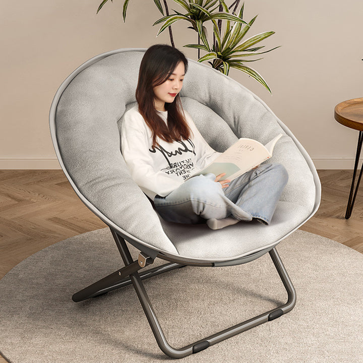 Silla reclinable plegable con respaldo de terciopelo redondo nórdico contemporáneo y estructura de acero al carbono en forma de X para sala de estar 