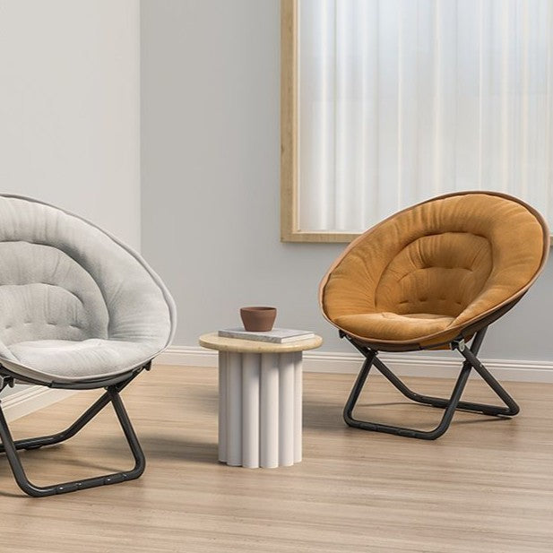 Silla reclinable plegable con respaldo de terciopelo redondo nórdico contemporáneo y estructura de acero al carbono en forma de X para sala de estar 