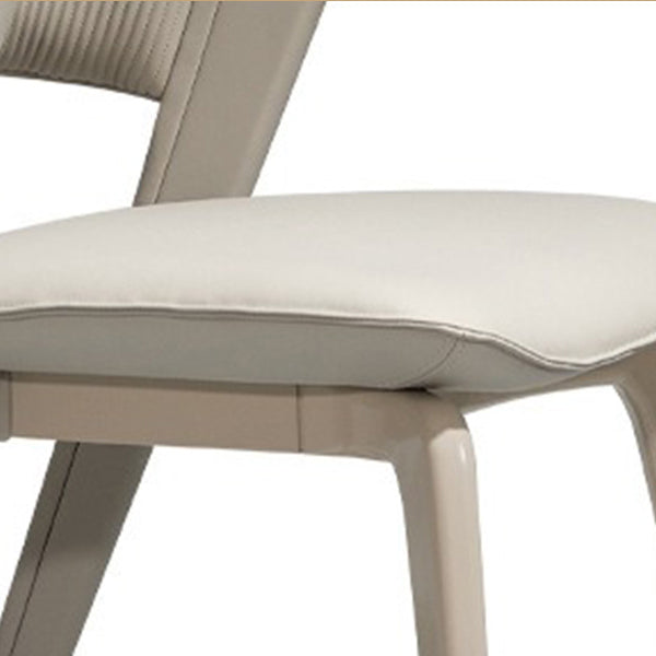Chaise de salle à manger moderne en cuir microfibre carrée avec cadre en métal et dossier arqué pour salle à manger 
