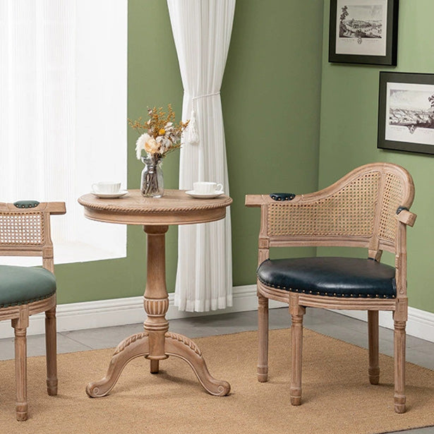 Silla de comedor de madera maciza tapizada en cuero genuino europeo tradicional con respaldo arqueado para comedor 