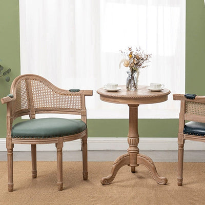 Silla de comedor de madera maciza tapizada en cuero genuino europeo tradicional con respaldo arqueado para comedor 