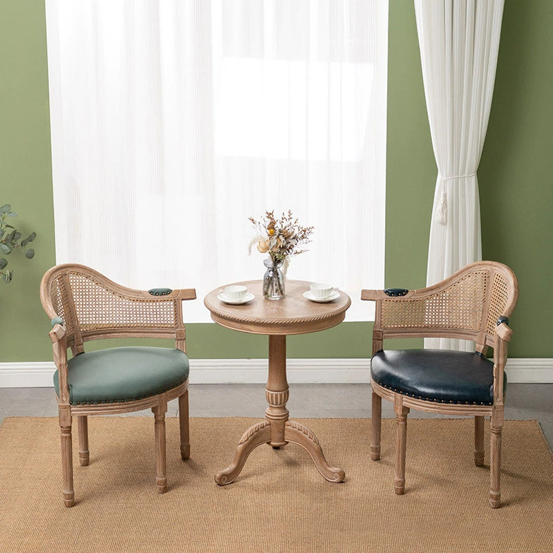 Silla de comedor de madera maciza tapizada en cuero genuino europeo tradicional con respaldo arqueado para comedor 