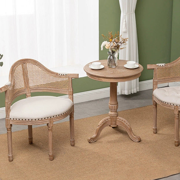 Silla de comedor de madera maciza tapizada en cuero genuino europeo tradicional con respaldo arqueado para comedor 