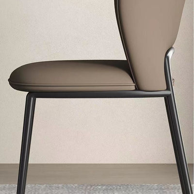 Silla de comedor escandinava contemporánea de cuero de microfibra cuadrada con respaldo de ala de acero al carbono para comedor 
